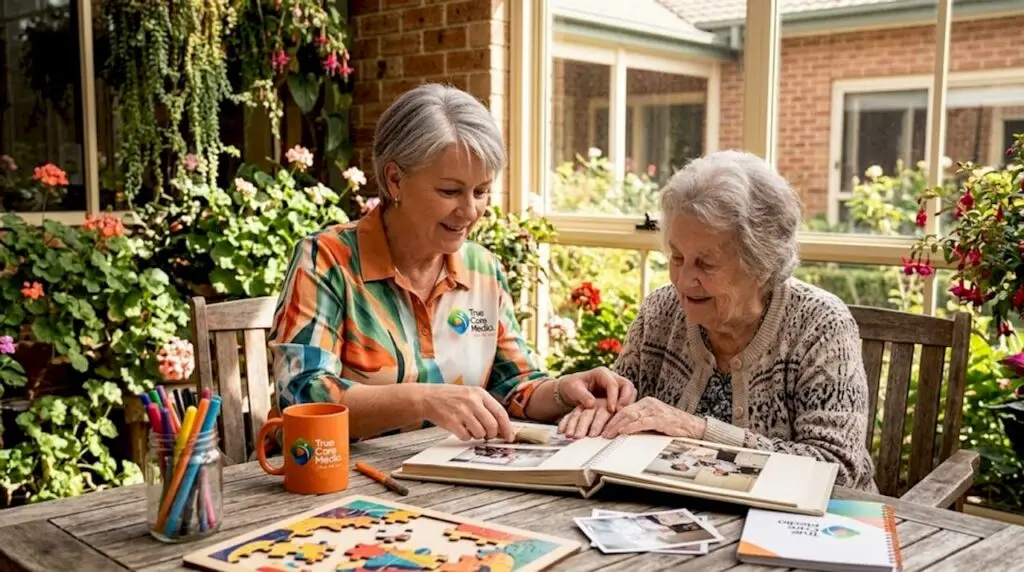 Activities coordinator and resident arranging photos