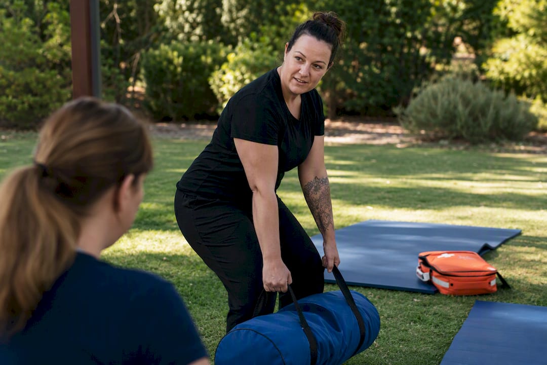 Support worker demonstrating manual handling technique