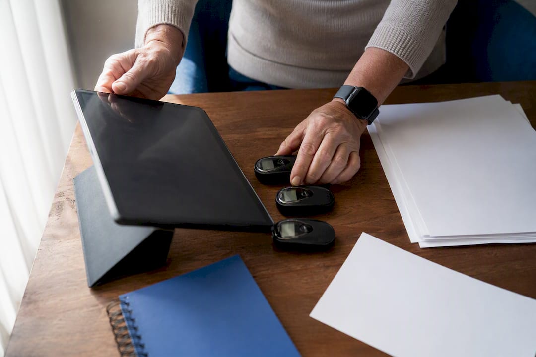 Hands preparing tracking tools for healthcare video